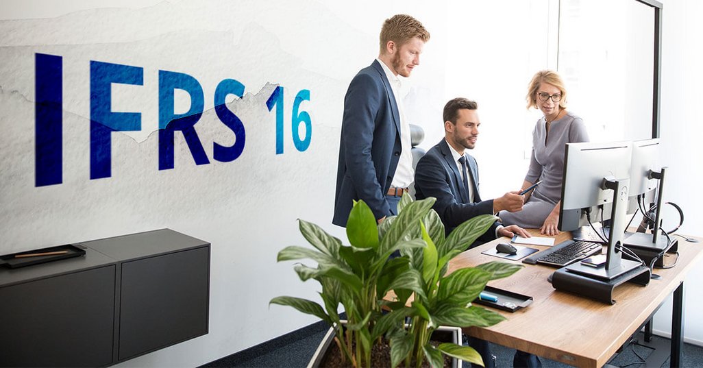 group of consultants working together at pc with ifrs 16 logo